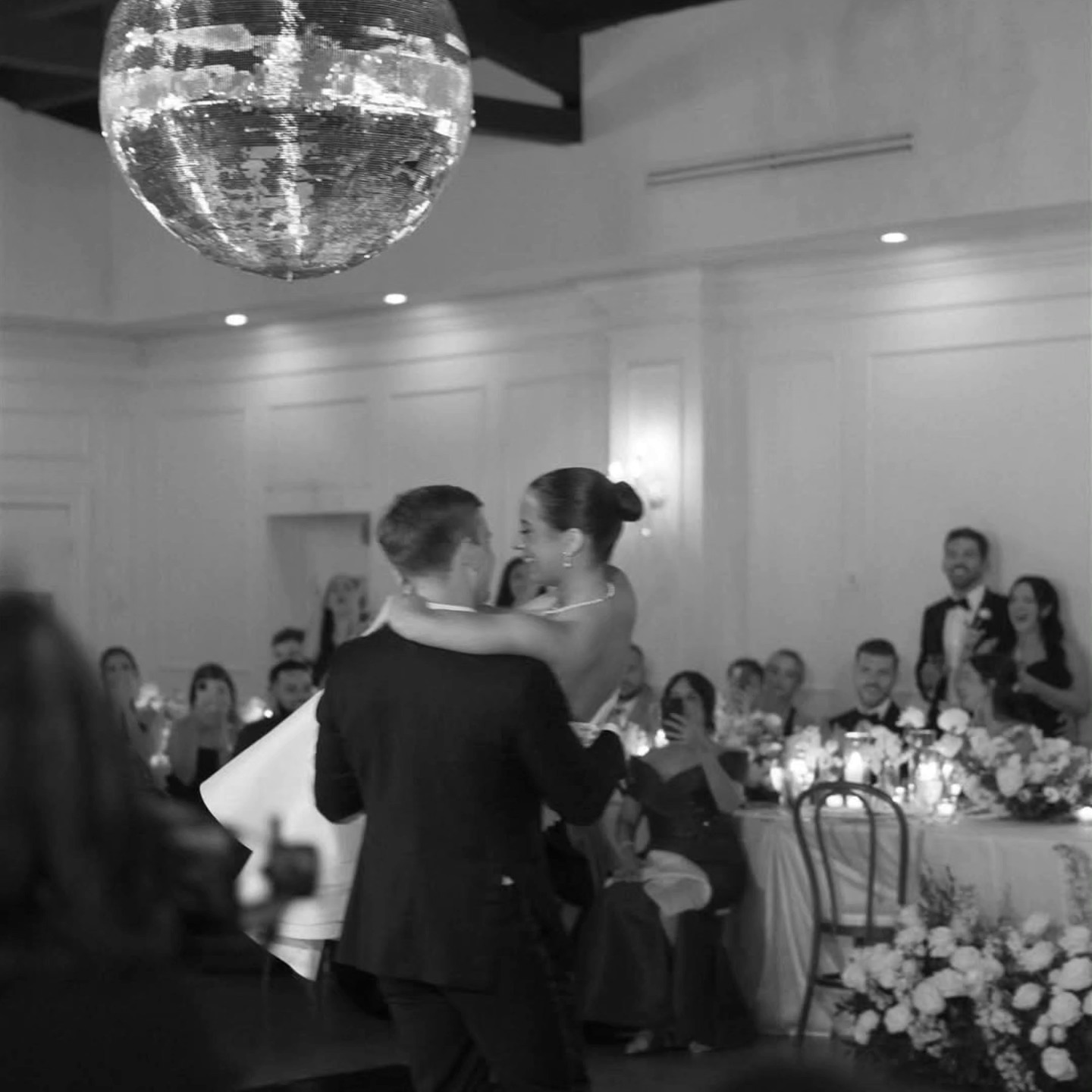 "All the love under the sparkle of our 30inch disco ball ✨ Miami nights have never been more magical. Cheers to unforgettable moments and endless celebrations! 🖤 
.
.
.
.
Venue: @theclubofknights
Planner: @amandagrahamevents
Photo: @nadiadiaznaval
Video: @melsfilms
Makeup & Hair: @madeyoulookk @myl.bridal
DJ & Photobooth: @visiondis
Content Creator: @contentconamor
Signage: @miamiwritesco
Rentals: @contempolinens & @simplerustic
Disco Ball: @madoddevents
Coffee Station: @aromaespressocappuccinobar
Musicians: @elegantmusicians
Dance Floor: @wrapmyfloor
.
.
.
.
#Miami #miamiwedding #miamiweddings #miamiweddingdecor #eventdecor #eventdecorator  #weddingdecor #weddingplanner #miamicoordinator #miamiweddingplanner #floridawedding #southfloridaweddings #miamiflorist #miamiweddingflorist #discoball #miamidiscoballs #weddingdisco