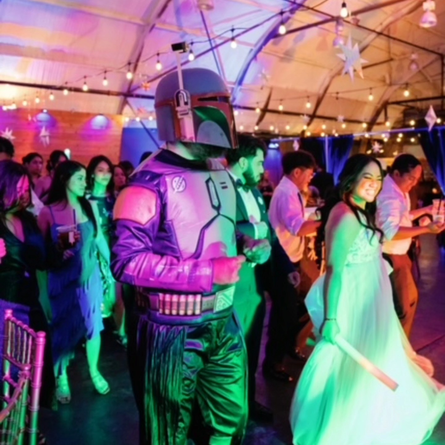 “When the galaxy’s most feared bounty hunter crashes the party… and leads the conga line.”
.
.
.
Photography by @thirdre3lstudios
.
#BobaGetsDown #StarWarsWeddingVibes #DanceYouWill #OrlandoWeddings #centralfloridawedding #centralfloridaplanner #orlandoplanner #orlandodecor #MayThe4thBeWithYou #StarWarsWedding
